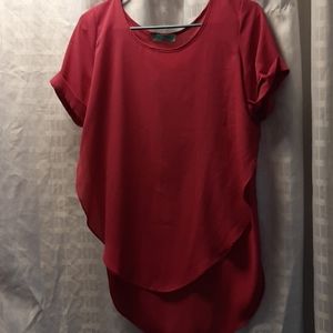 Silky shirt open on both sides.